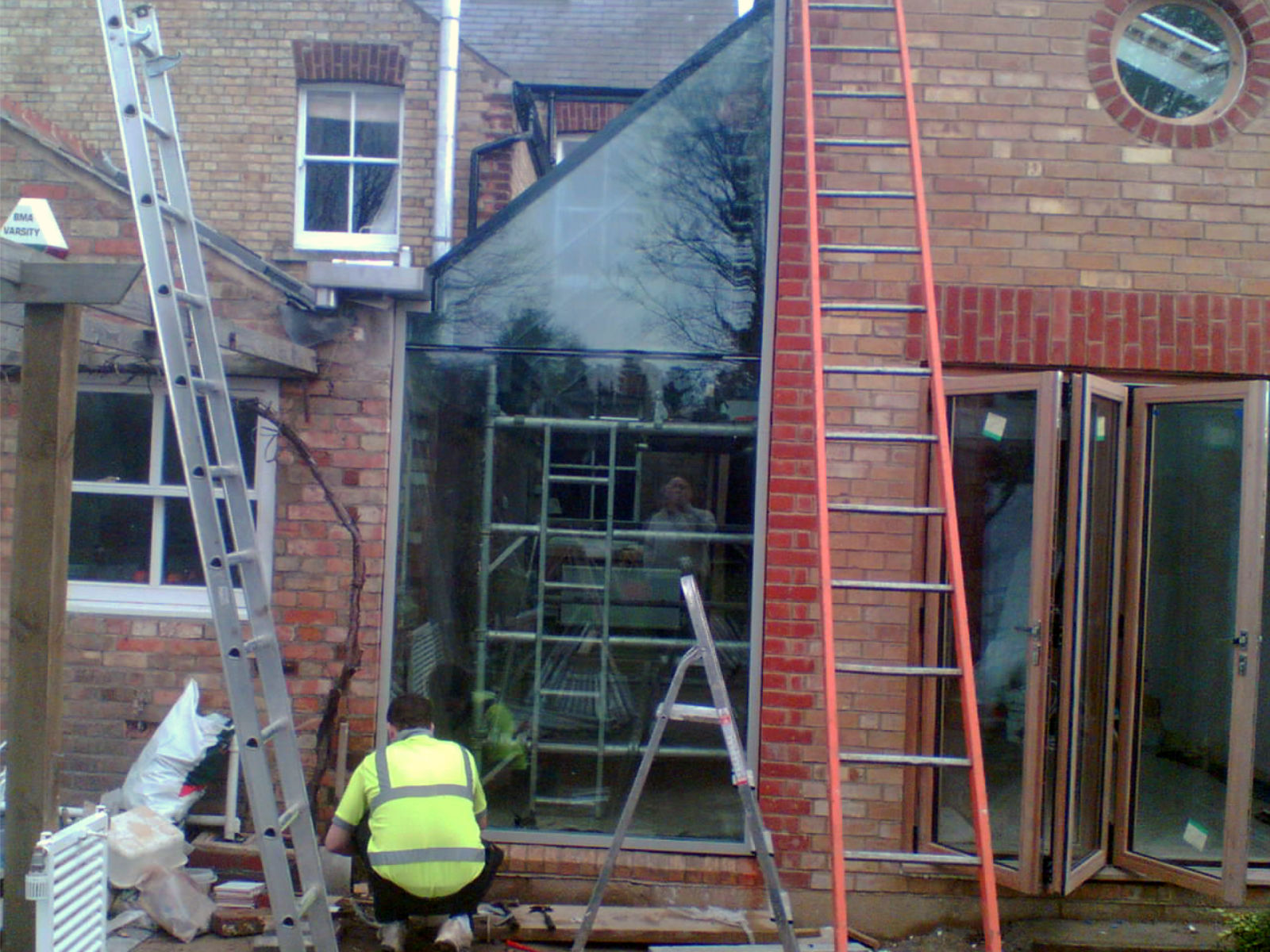 Install residential structural glass.